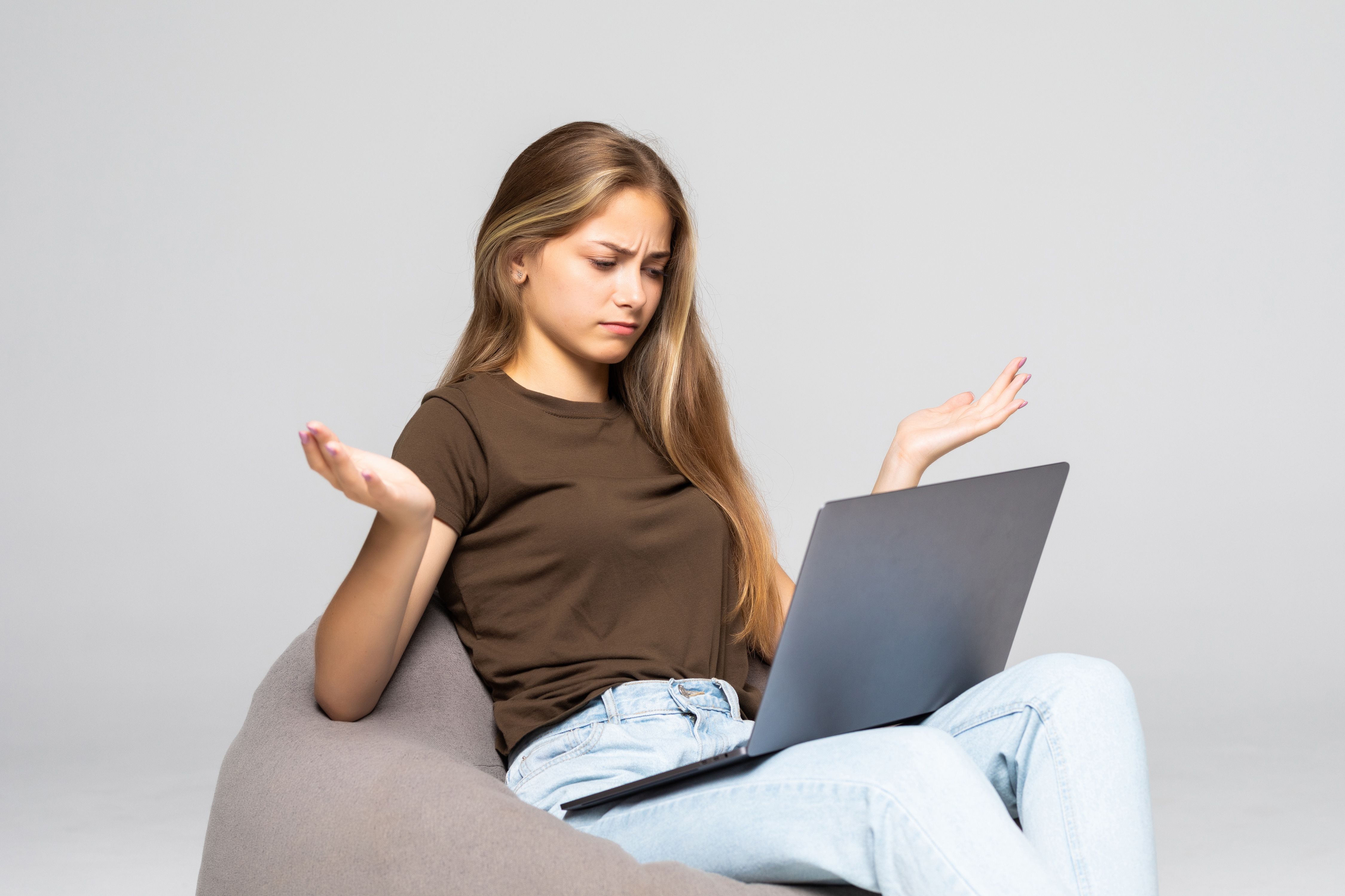 depressed-frustrated-woman-working-with-computer-laptop-desperate-work-isolated-white-wall-depression.jpg